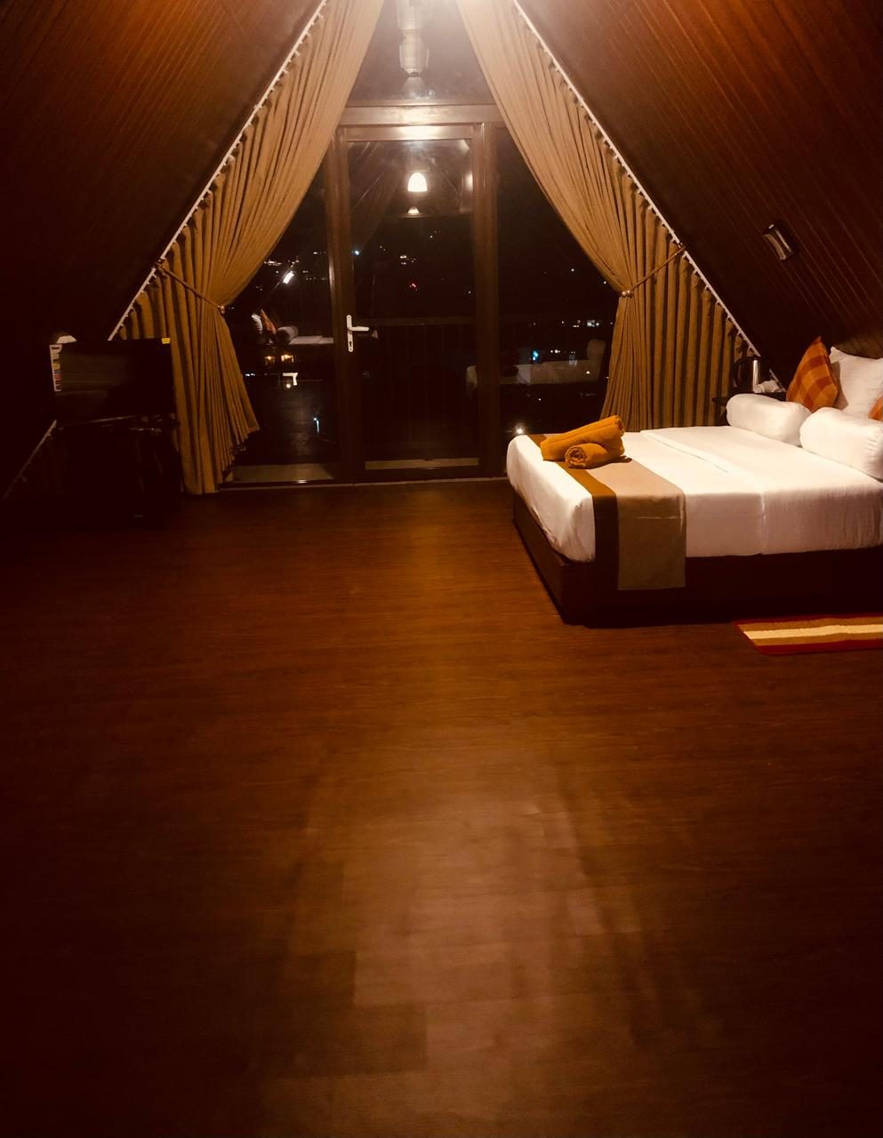 Cabana family room at night under the A-frame roof