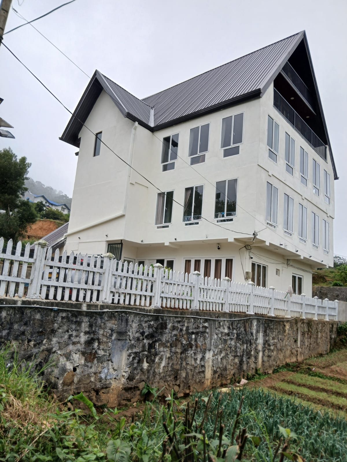 House with white fence